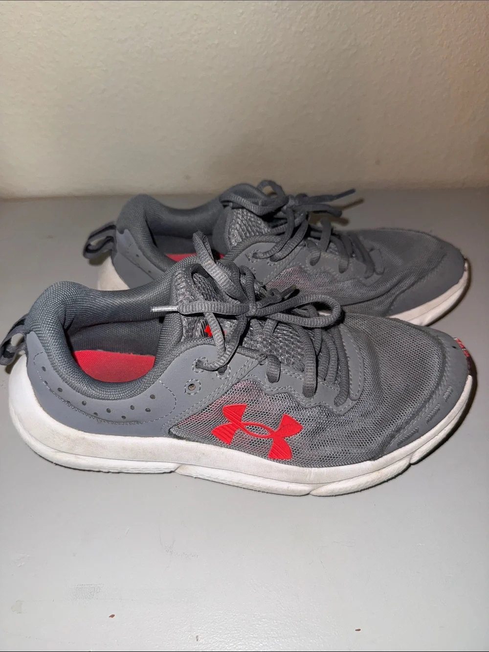 Under Armour Kids Gray Sneakers with Red Logo